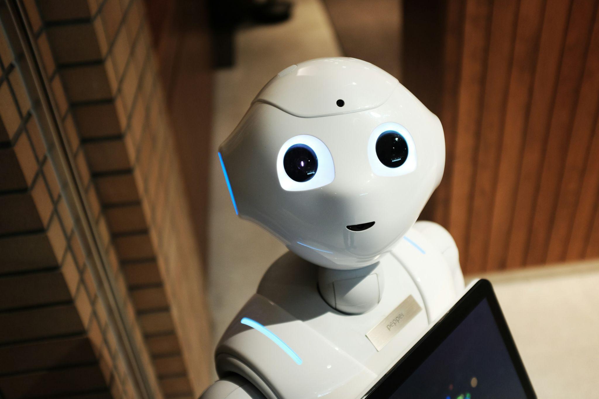 AI-powered humanoid robot assisting with HR tasks and employee engagement