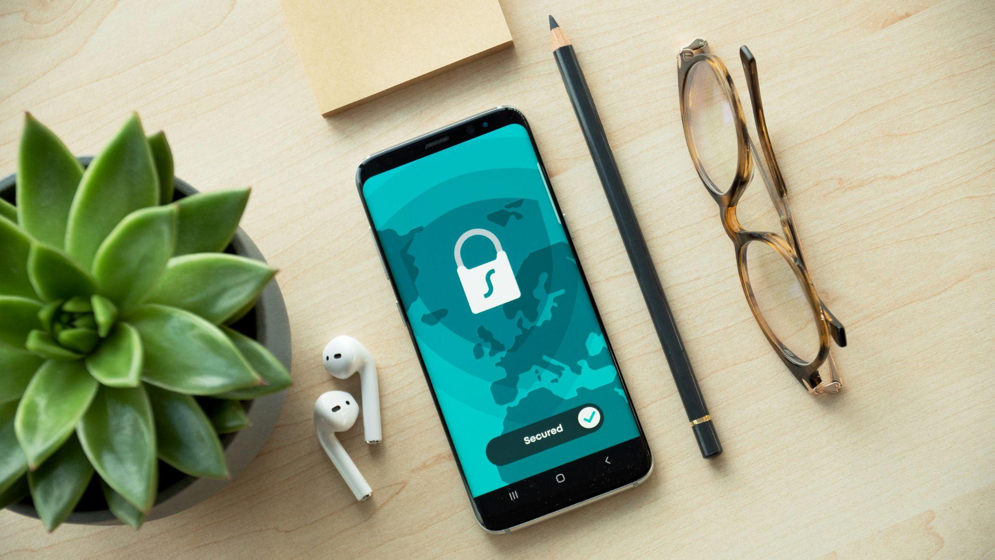 Phone with a secure lock screen representing secure practices against phishing scams in HR departments