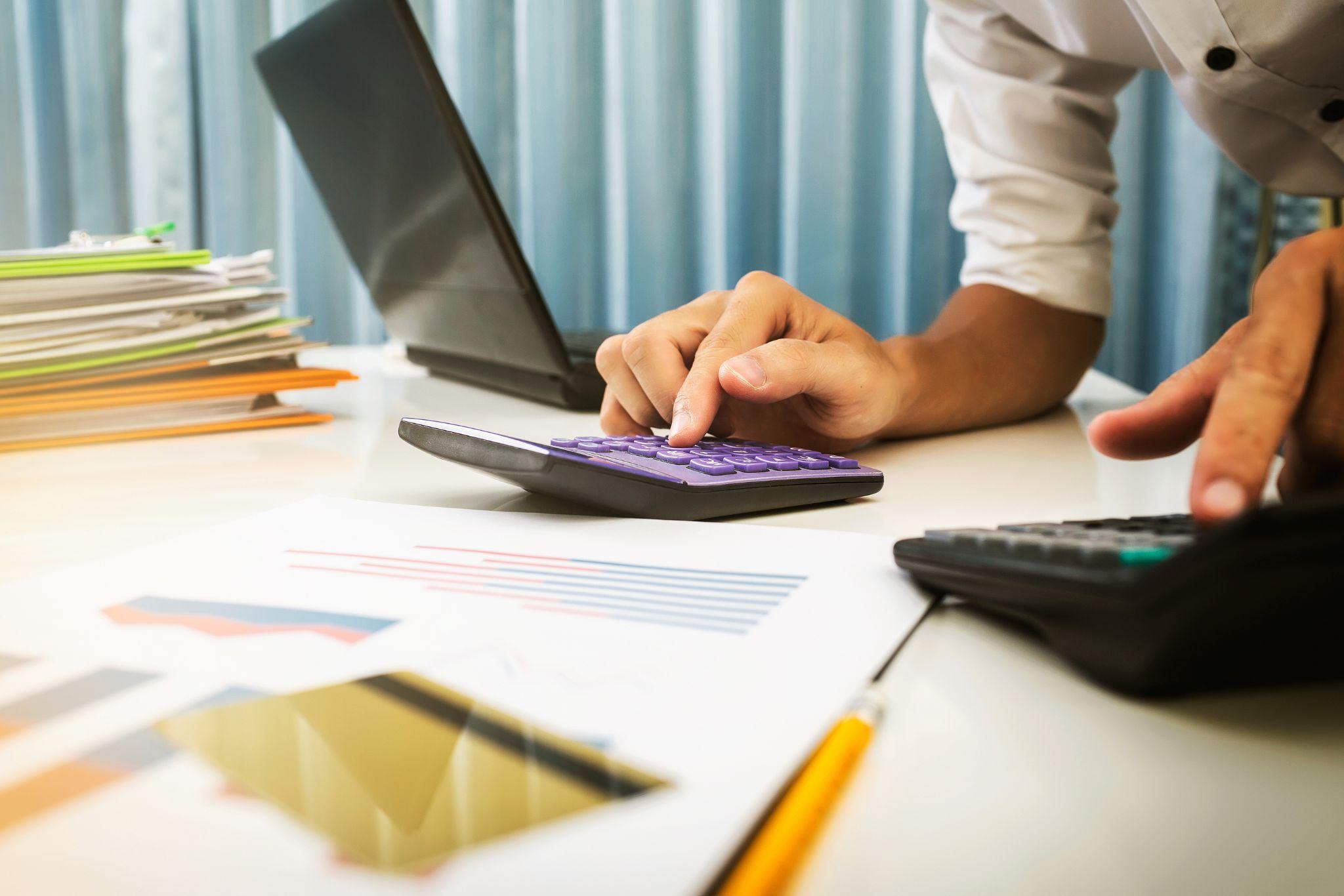 Payroll administrator auditing wage statements for California compliance